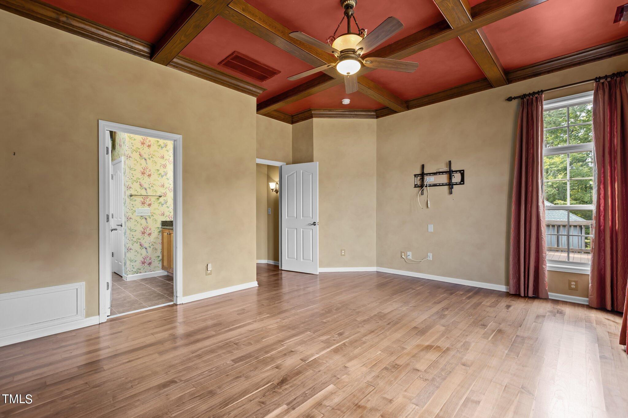 6112 Blakeman Lane Raleigh, NC 27617 - Photo 26 of 56 a view of an empty room with a window