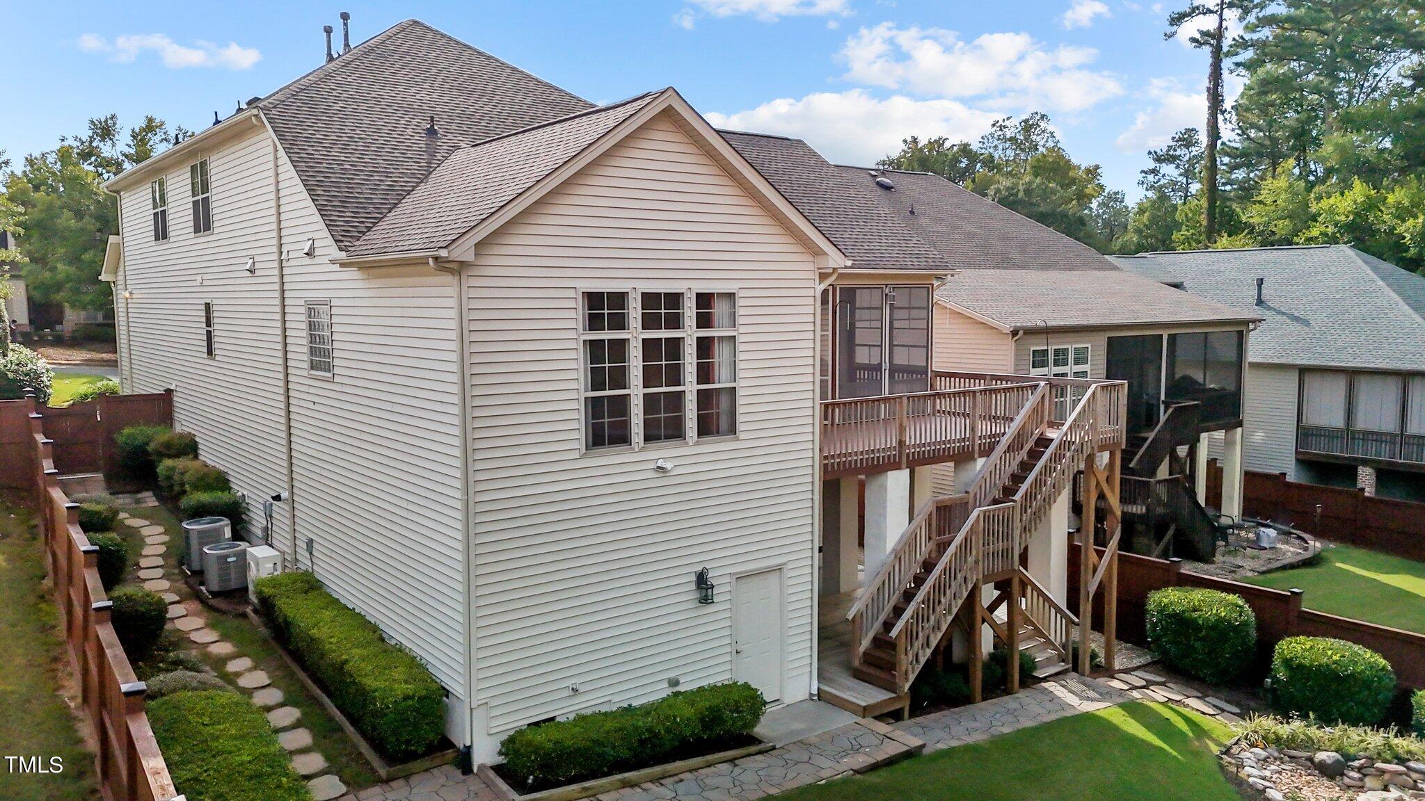 6112 Blakeman Lane Raleigh, NC 27617 - Photo 50 of 56 a view of a house with backyard