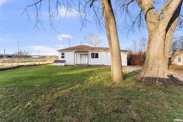 a house with river in front of it