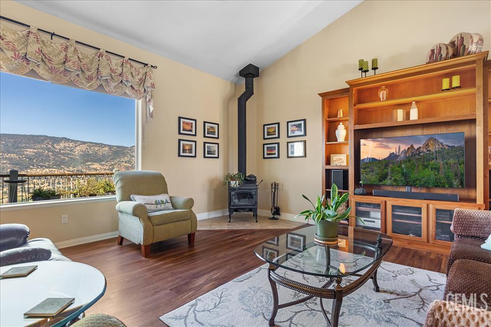 Undisclosed Address Tehachapi, CA 93561 - Photo 11 of 62 a living room with furniture fireplace and a large window