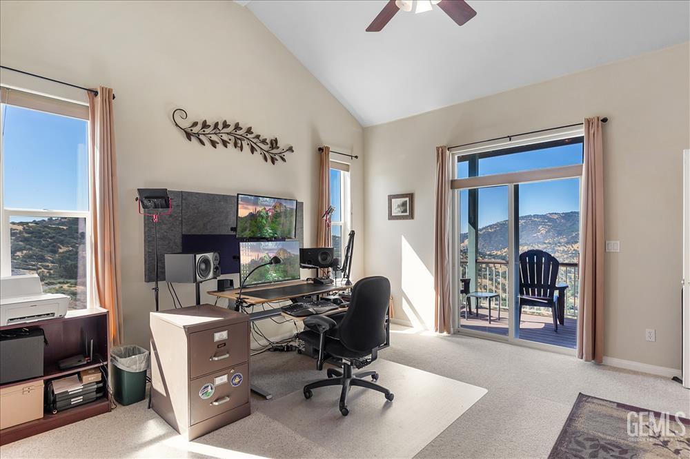 Undisclosed Address Tehachapi, CA 93561 - Photo 28 of 62 a view of a workspace with furniture and a window