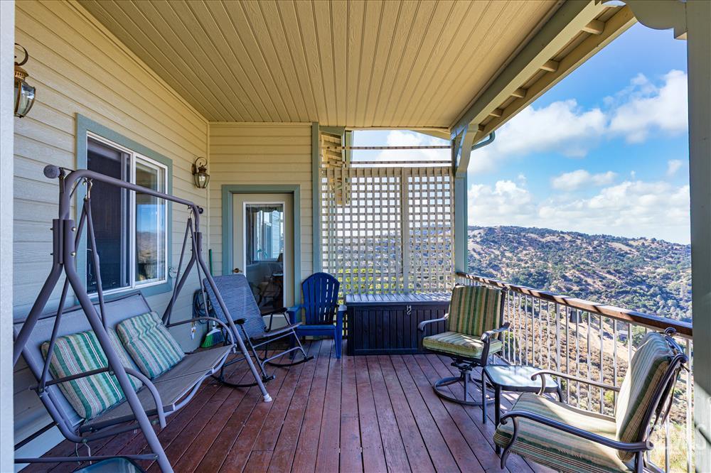 Undisclosed Address Tehachapi, CA 93561 - Photo 50 of 62 a view of a livingroom with furniture and deck