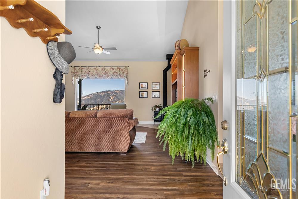 Undisclosed Address Tehachapi, CA 93561 - Photo 5 of 62 a living room with furniture and a chandelier