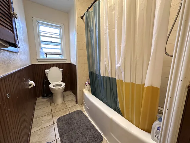 a bathroom with a toilet and a sink