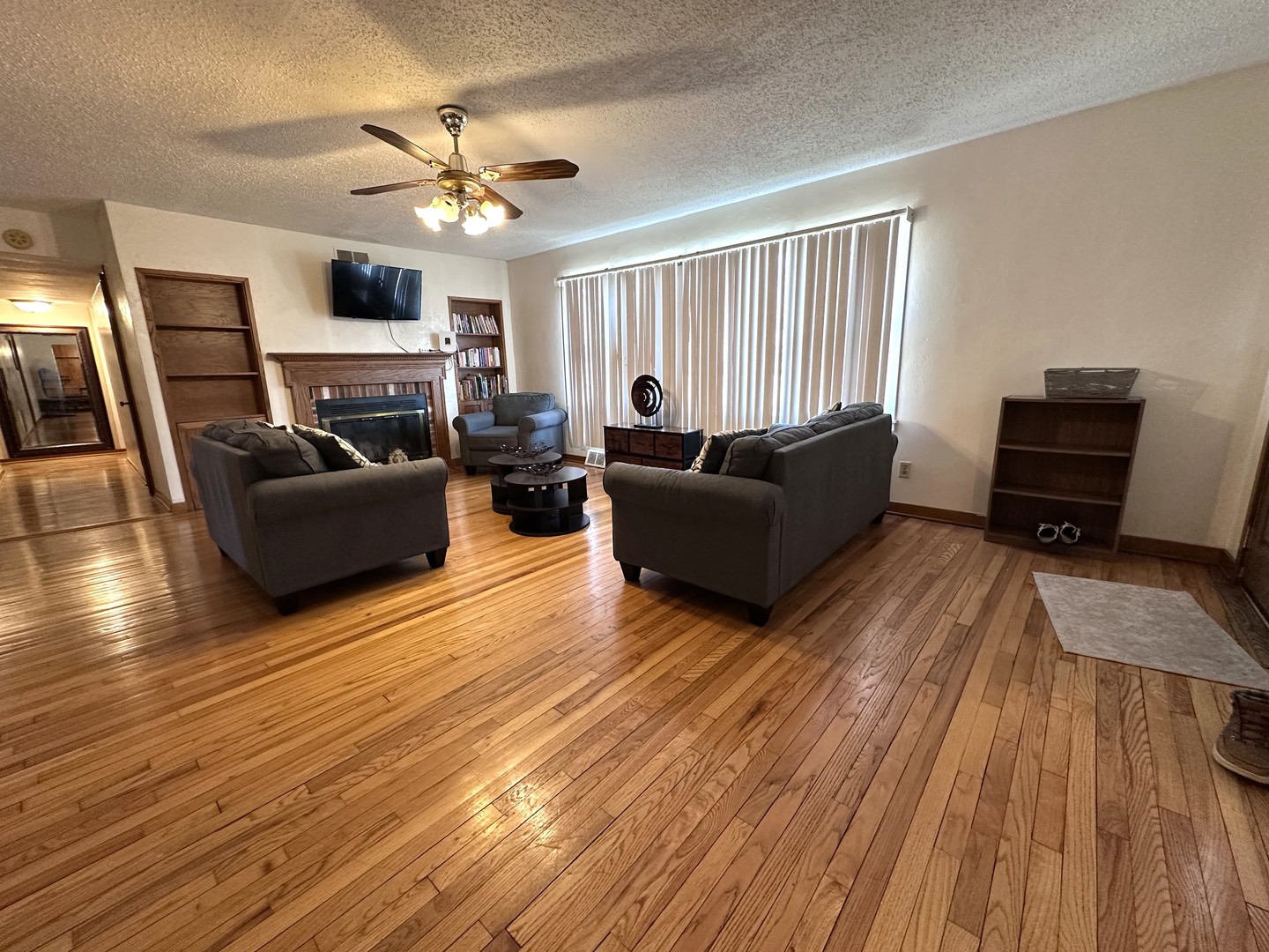 1107 Locust Street Sterling, IL 61081 - Photo 3 of 16 a living room with furniture and a wooden floor