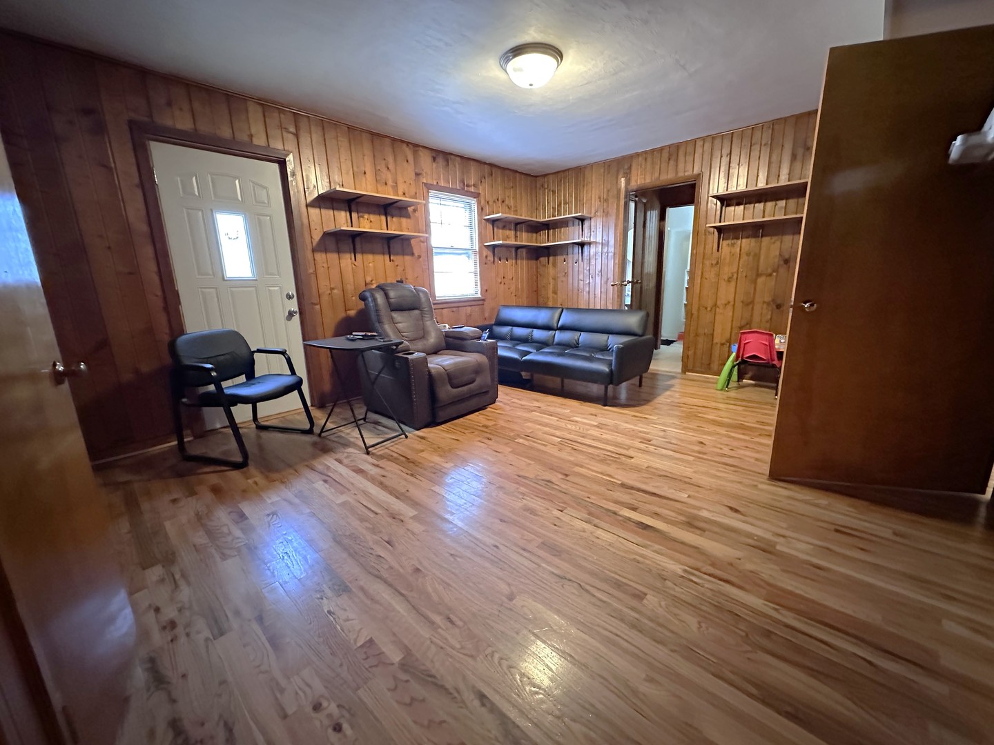 1107 Locust Street Sterling, IL 61081 - Photo 7 of 16 a living room with furniture and wooden floor