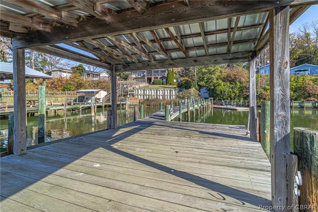 549 Long Point Lane Topping, VA 23169 - Photo 35 of 48 Wonderful covered area at the end of the dock