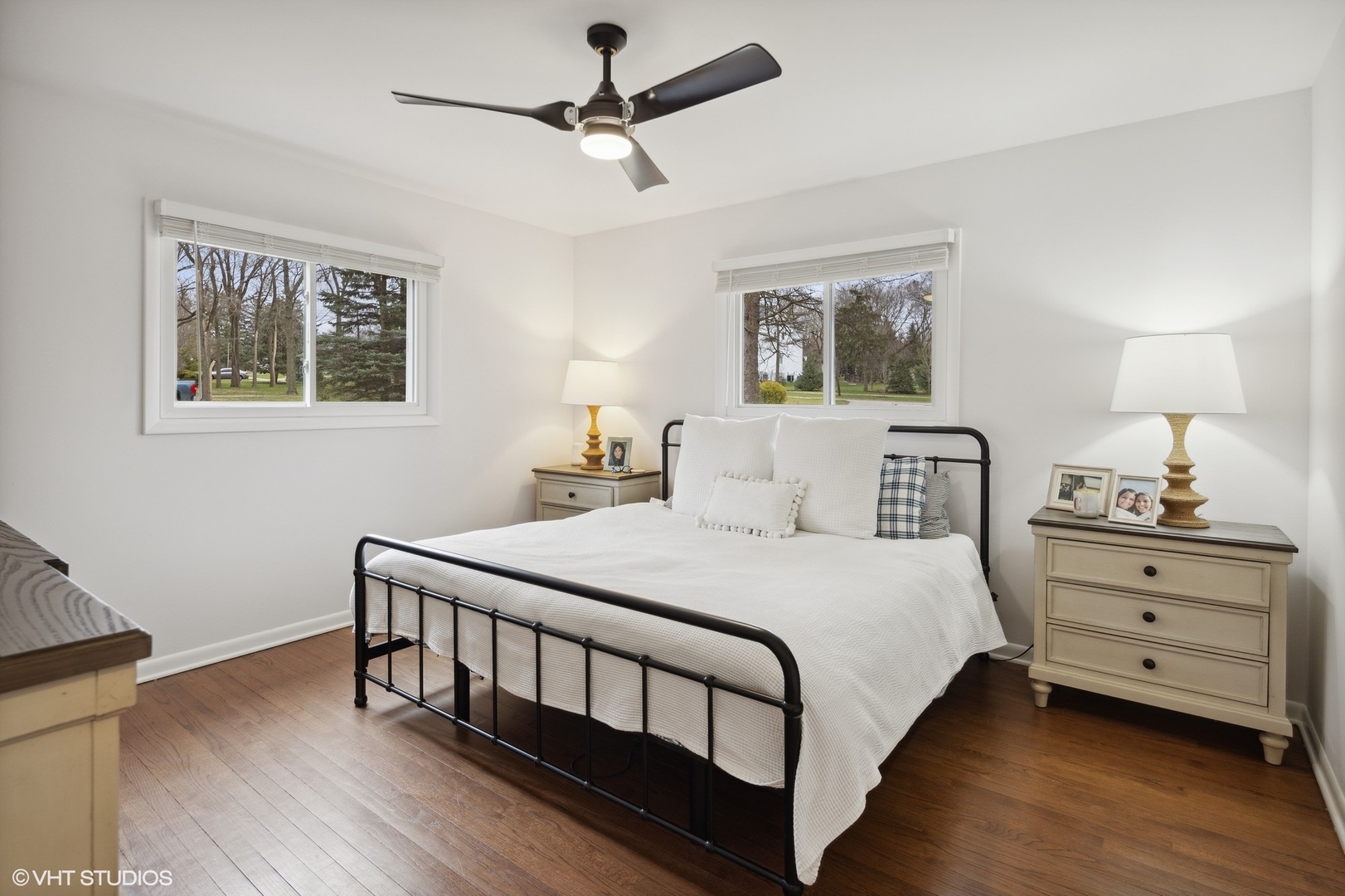 607 Pine Street Batavia, IL 60510 - Photo 15 of 39 a bedroom with a bed and a chandelier