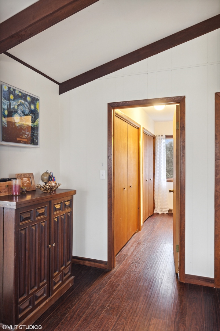 607 Pine Street Batavia, IL 60510 - Photo 21 of 39 a view of a hallway with wooden floor