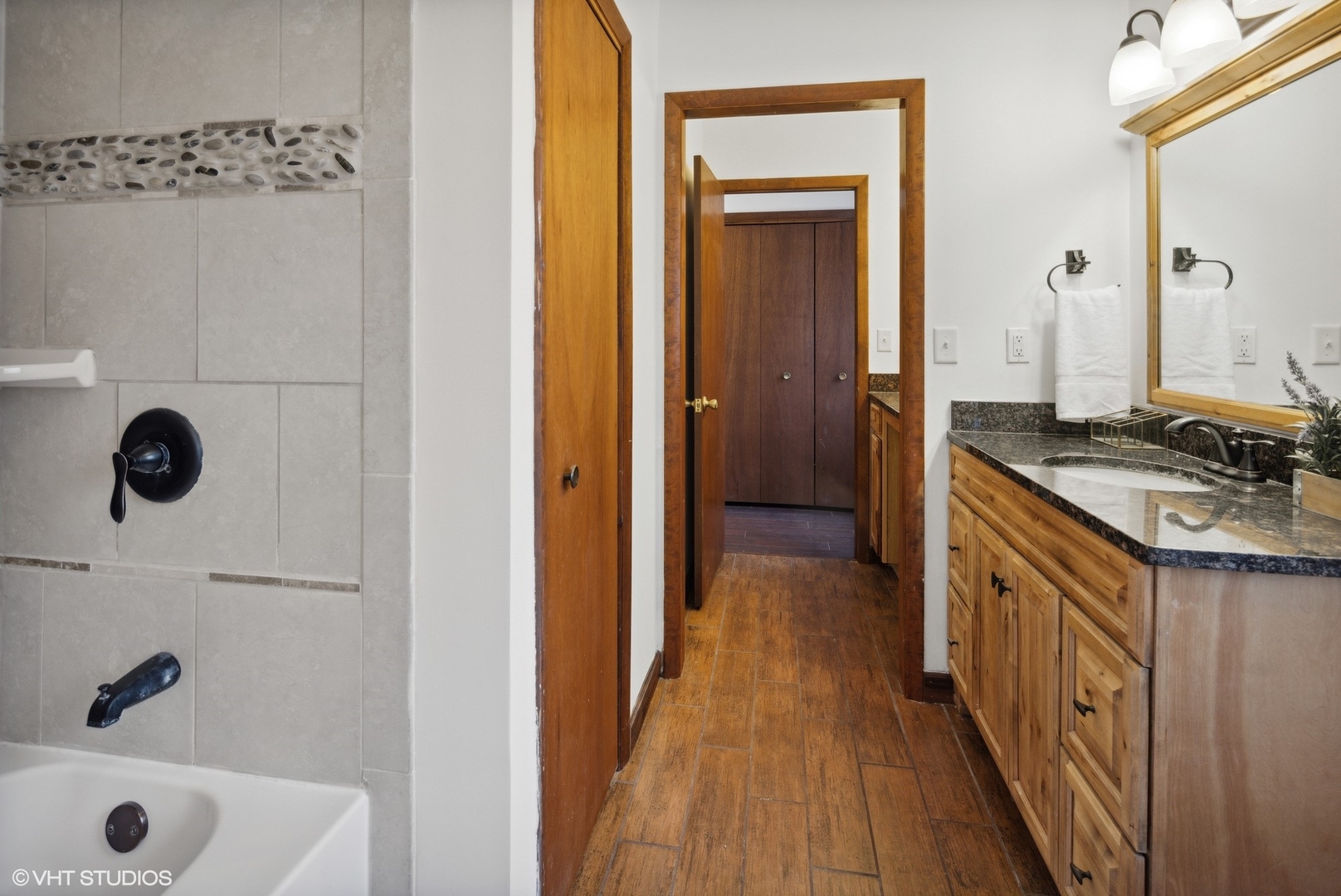 607 Pine Street Batavia, IL 60510 - Photo 23 of 39 a view of a bathroom from a hallway