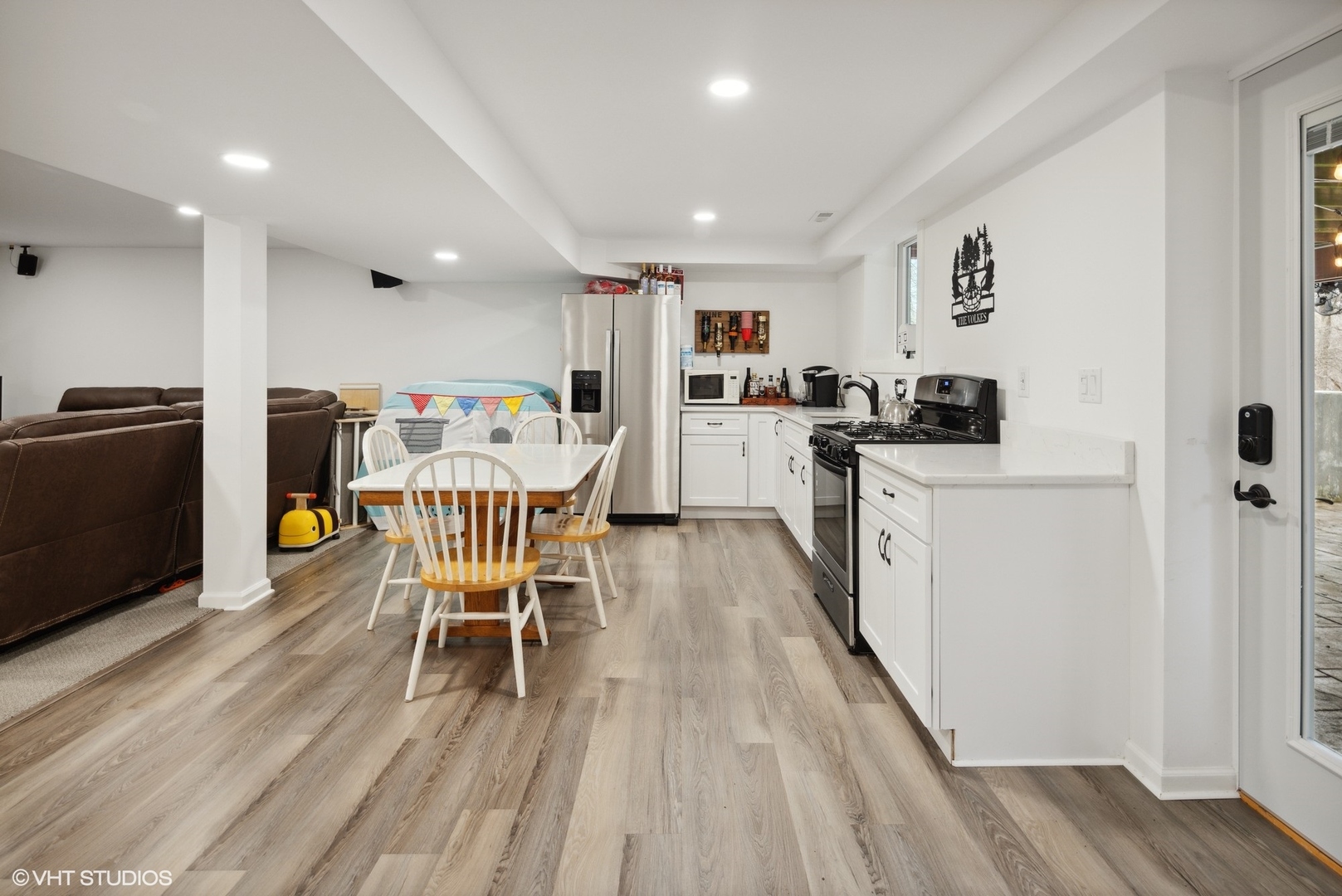 607 Pine Street Batavia, IL 60510 - Photo 25 of 39 a view of a dining room with furniture and wooden floor