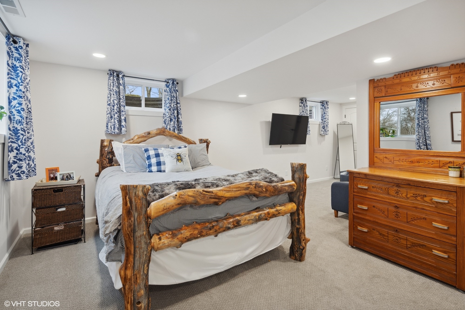 607 Pine Street Batavia, IL 60510 - Photo 30 of 39 a bedroom with a bed and a flat tv screen on wall