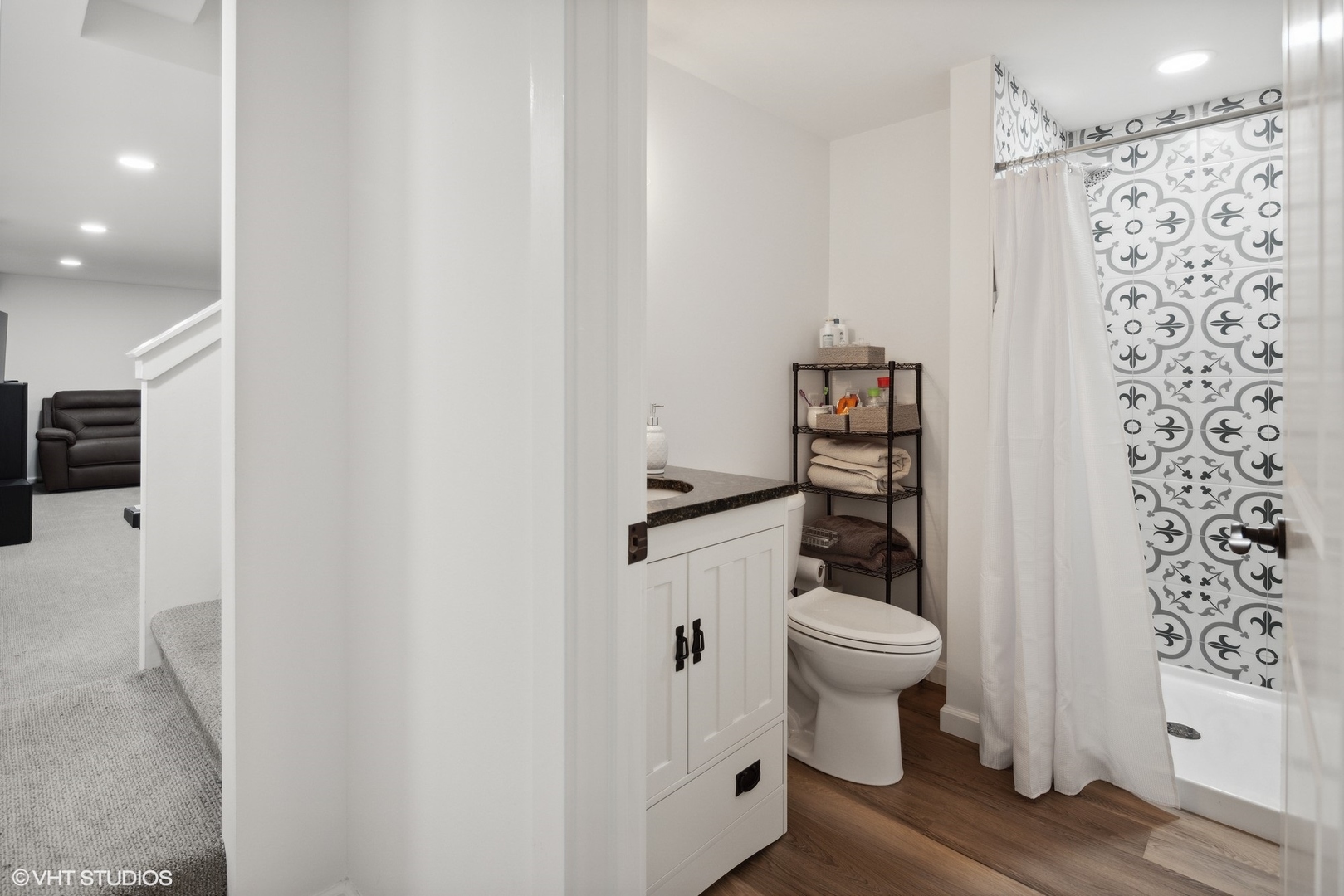 607 Pine Street Batavia, IL 60510 - Photo 31 of 39 a white toilet sitting next to a bathroom sink