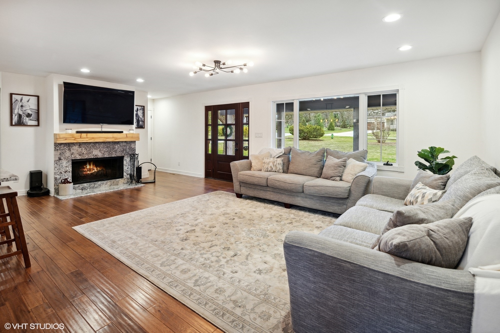 607 Pine Street Batavia, IL 60510 - Photo 9 of 39 a living room with furniture and a fireplace