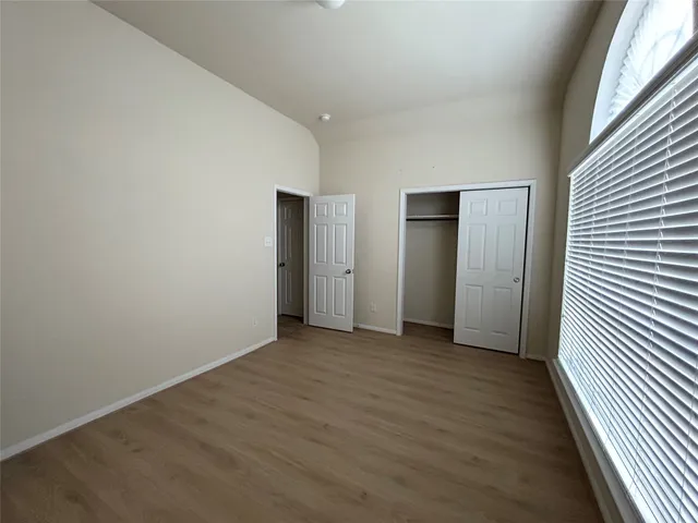 a view of a livingroom with wooden floor