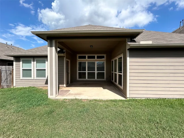 a house view with a garden space