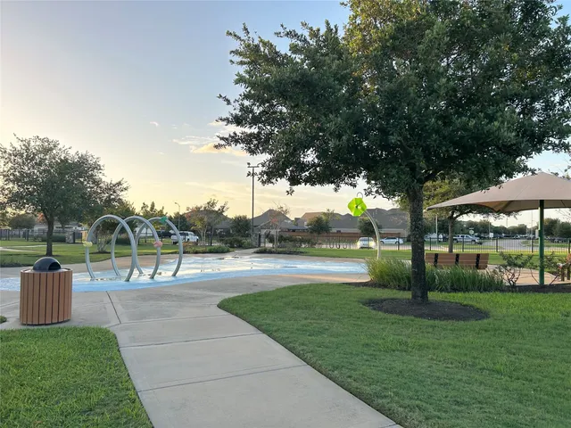 a view of a park with swings
