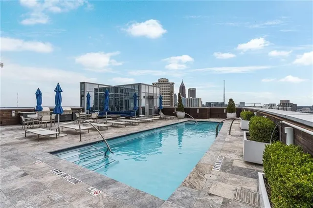 a black car park in front of a building