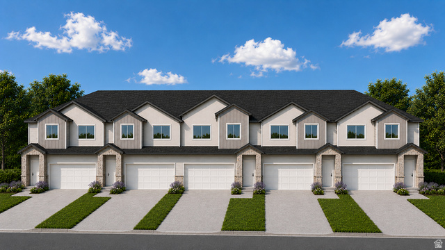 237 South Oliver Way, Unit N39 Grantsville, UT 84029 - Photo 1 of 4 Modern townhome exteriors featuring light stucco, dark siding, and stone accents