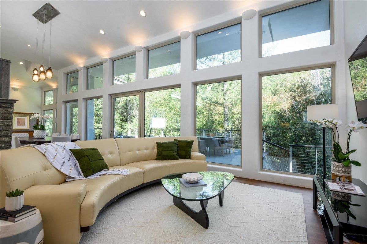 16345 Sanborn Road Saratoga, CA 95070 - Photo 11 of 31 a living room with furniture and a large window