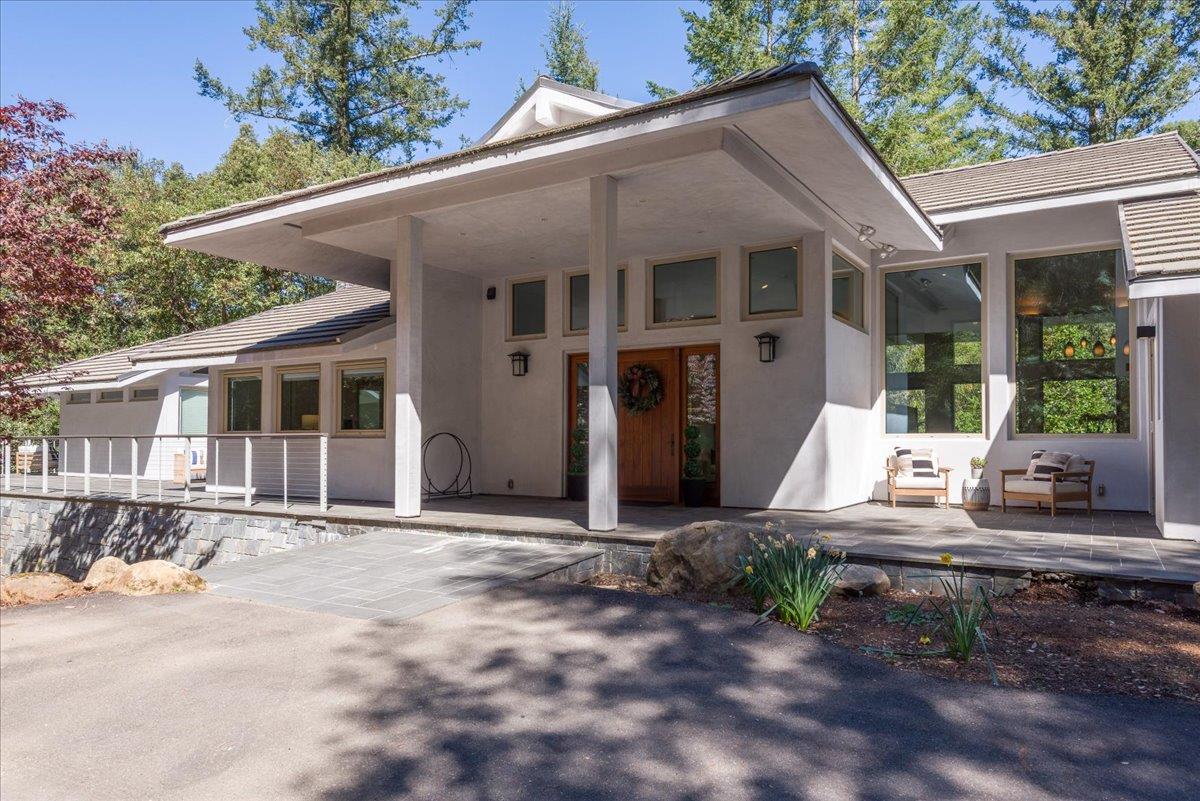 16345 Sanborn Road Saratoga, CA 95070 - Photo 2 of 31 a front view of a house with porch