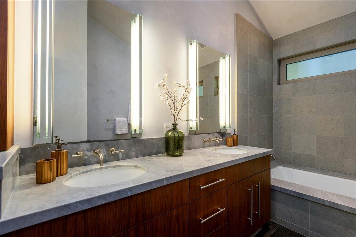 16345 Sanborn Road Saratoga, CA 95070 - Photo 23 of 31 a bathroom with a sink double vanity and a mirror