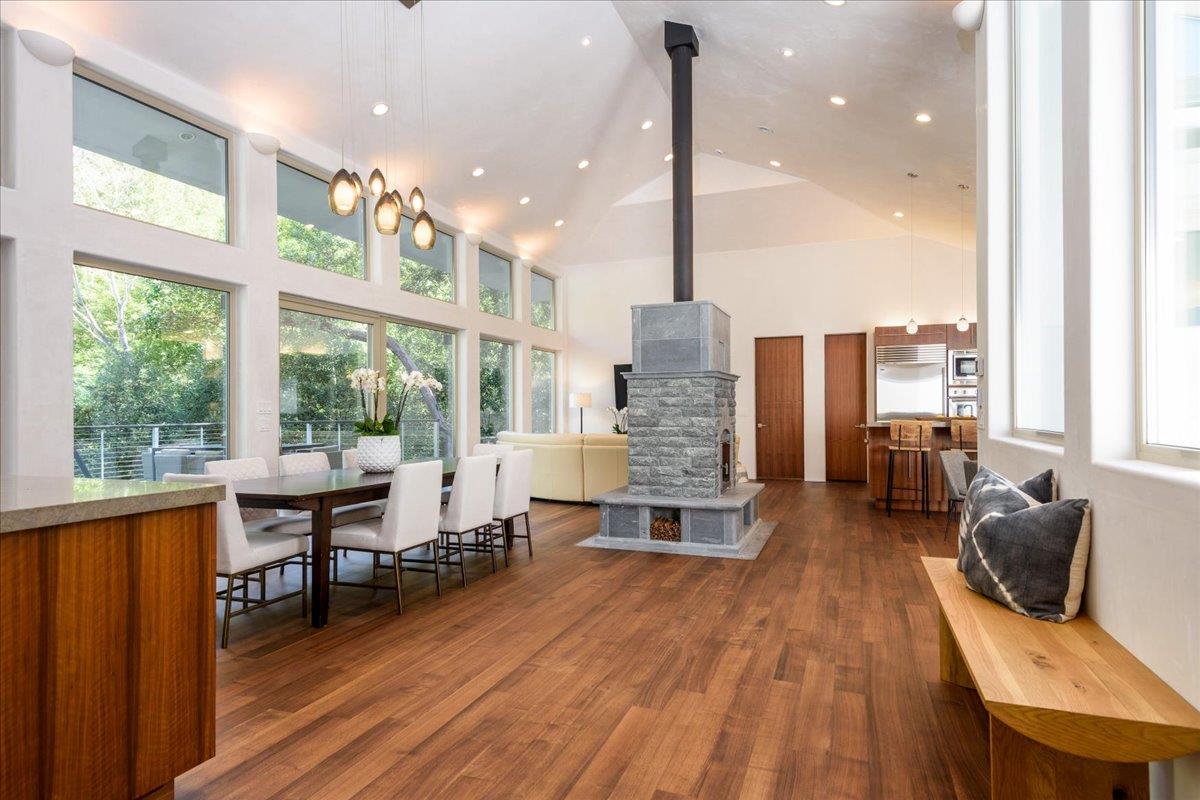 16345 Sanborn Road Saratoga, CA 95070 - Photo 5 of 31 a living room with furniture and large windows