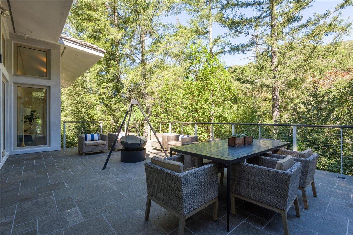 16345 Sanborn Road Saratoga, CA 95070 - Photo 8 of 31 a view of a patio with a couple of chairs