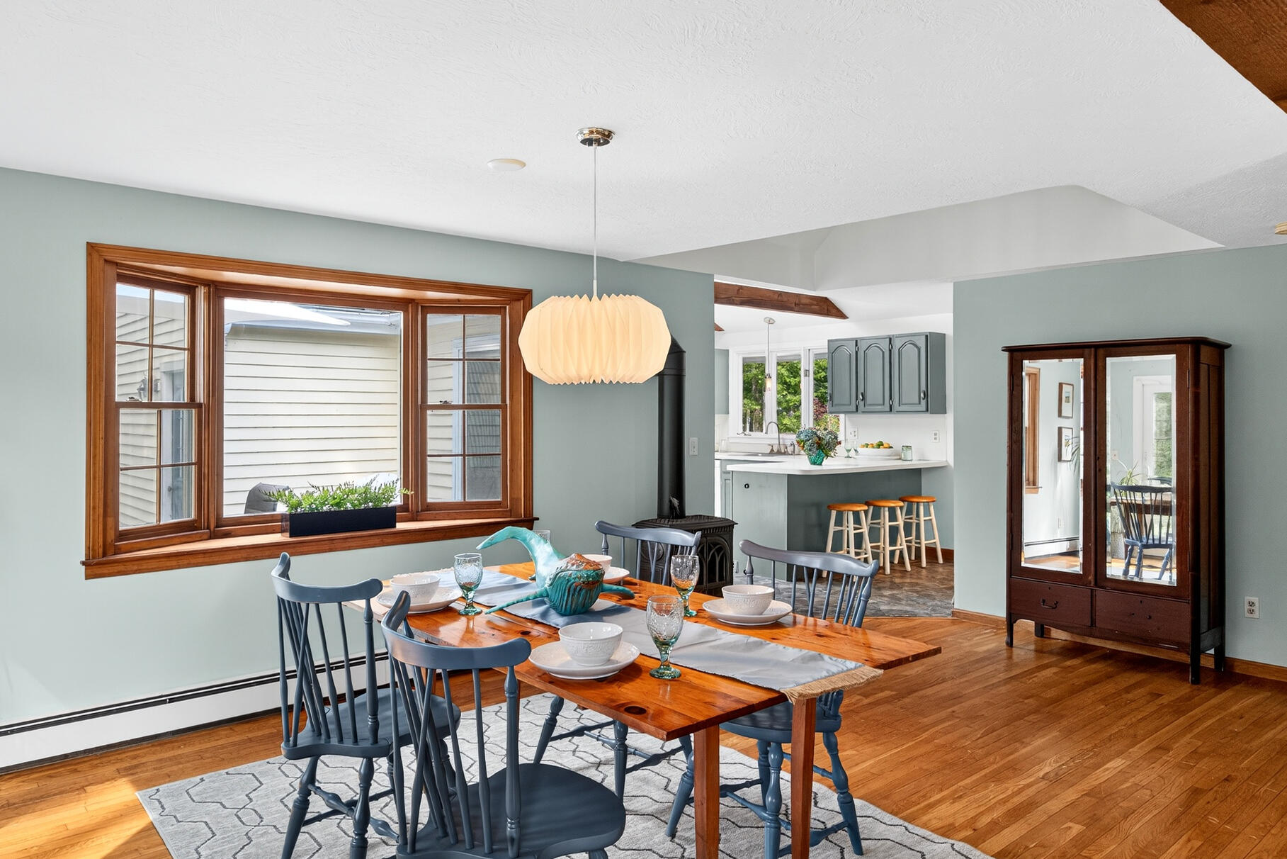 24 Tracey Road Cotuit, MA 02635 - Photo 17 of 45 a dining room with furniture and window