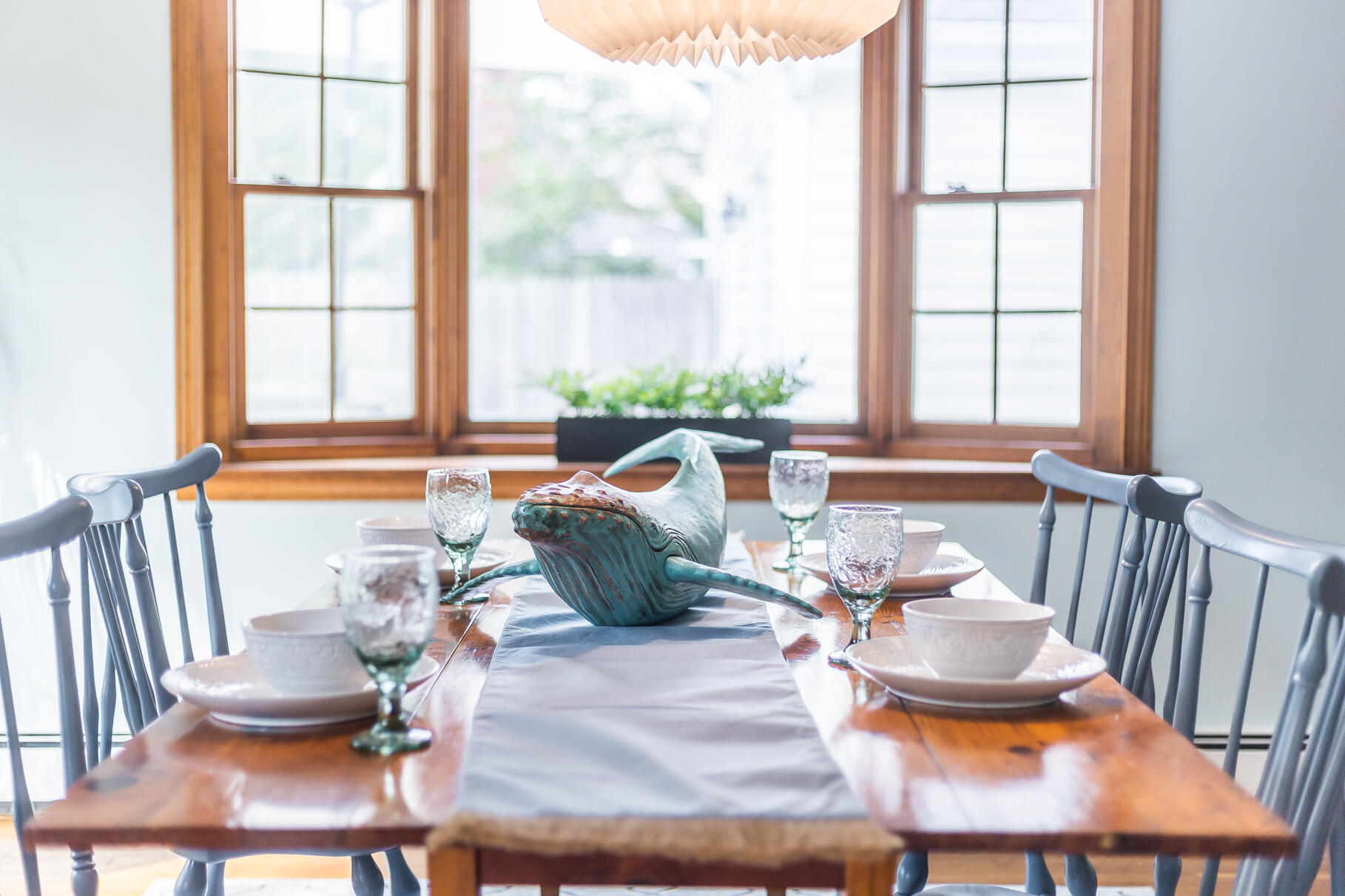 24 Tracey Road Cotuit, MA 02635 - Photo 18 of 45 a living room with furniture and a large window