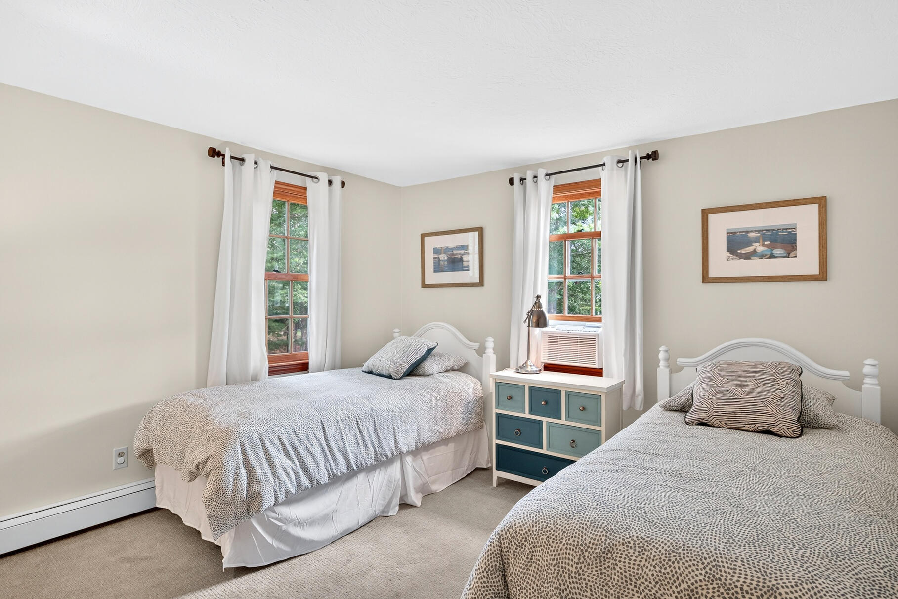 24 Tracey Road Cotuit, MA 02635 - Photo 38 of 45 a bedroom with a bed and window