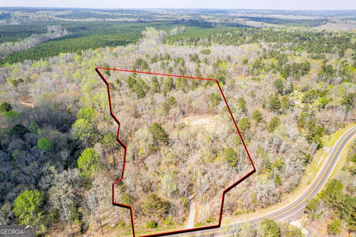 357 Old Copelan Road Southeast Eatonton, GA 31024 - Photo 1 of 15 a view of a lake from a balcony