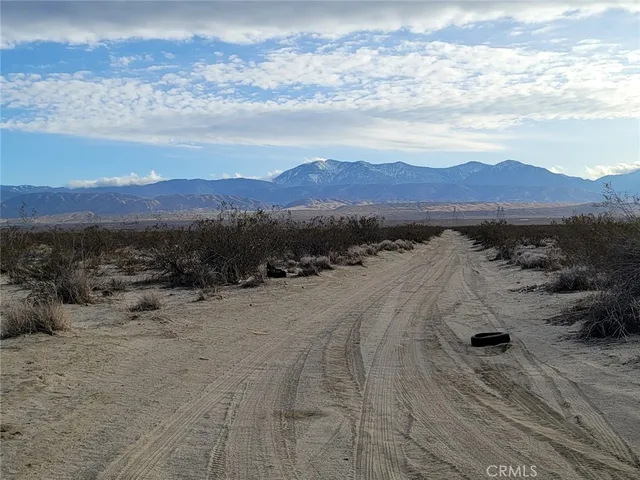 a view of an outdoor space and mountain view