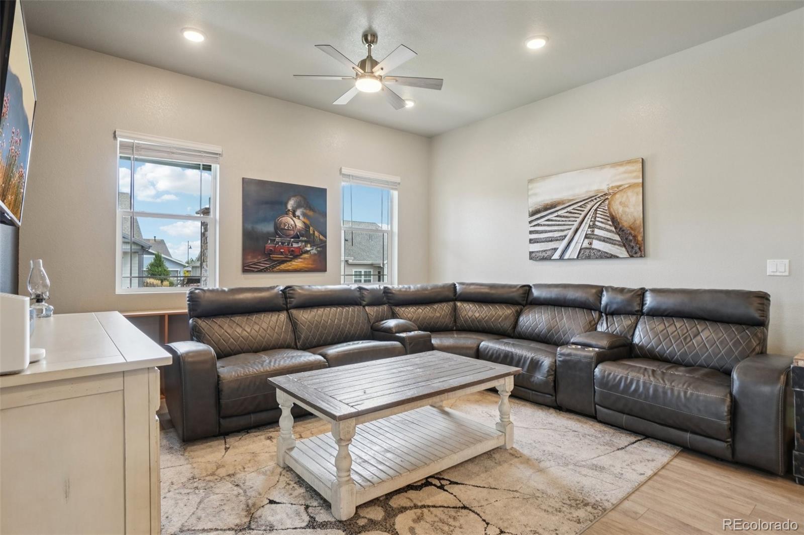 12541 Lake View Street Firestone, CO 80504 - Photo 13 of 50 a living room with furniture and a large window