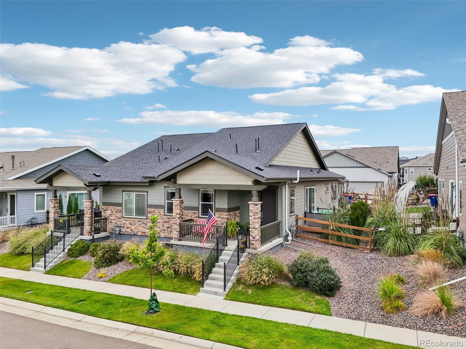 12541 Lake View Street Firestone, CO 80504 - Photo 2 of 50 a front view of a house with a yard