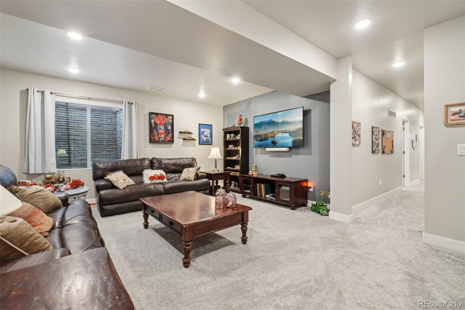 12541 Lake View Street Firestone, CO 80504 - Photo 24 of 50 a living room with furniture and large window