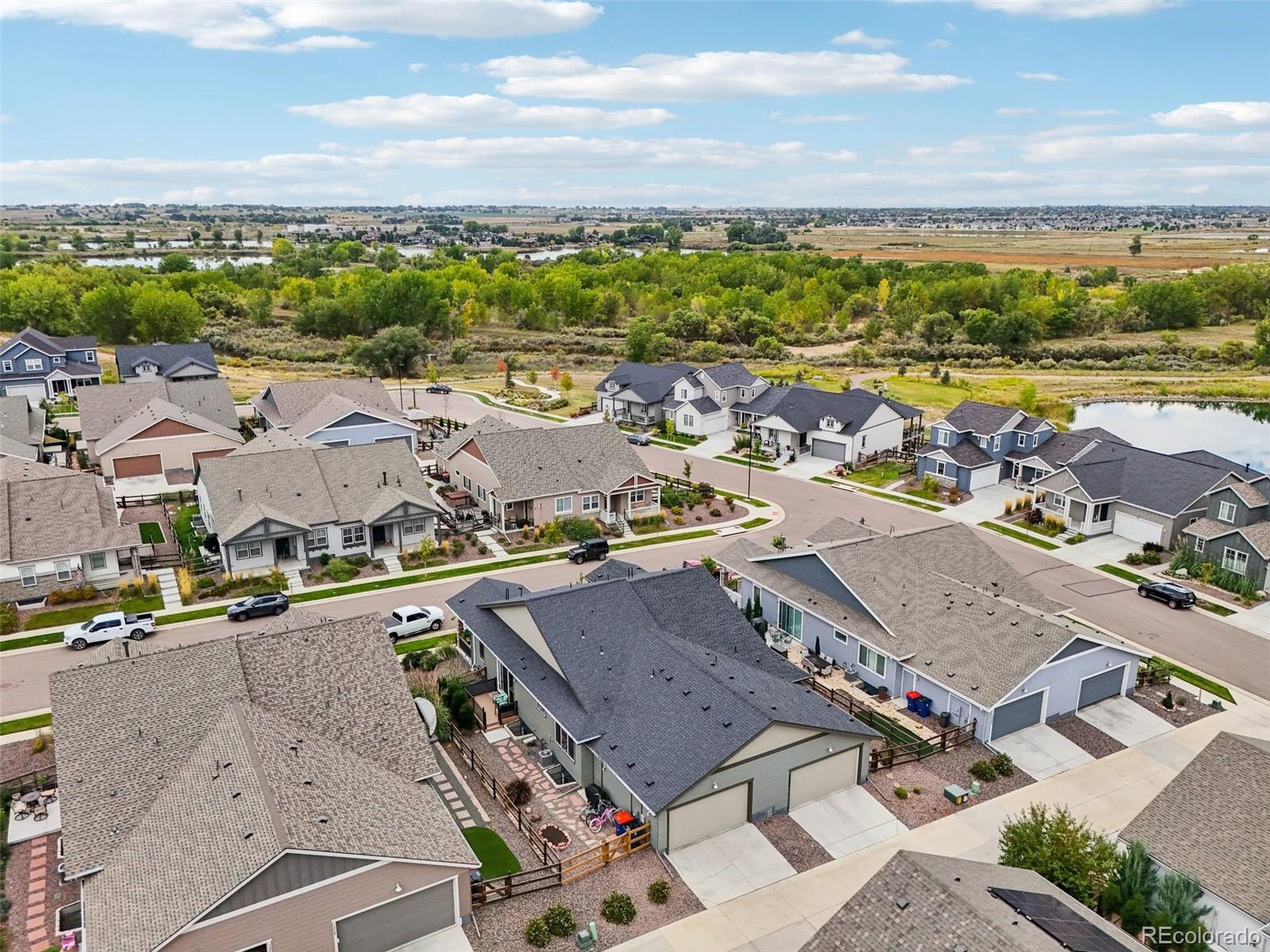 12541 Lake View Street Firestone, CO 80504 - Photo 33 of 50 an aerial view of residential houses with outdoor space