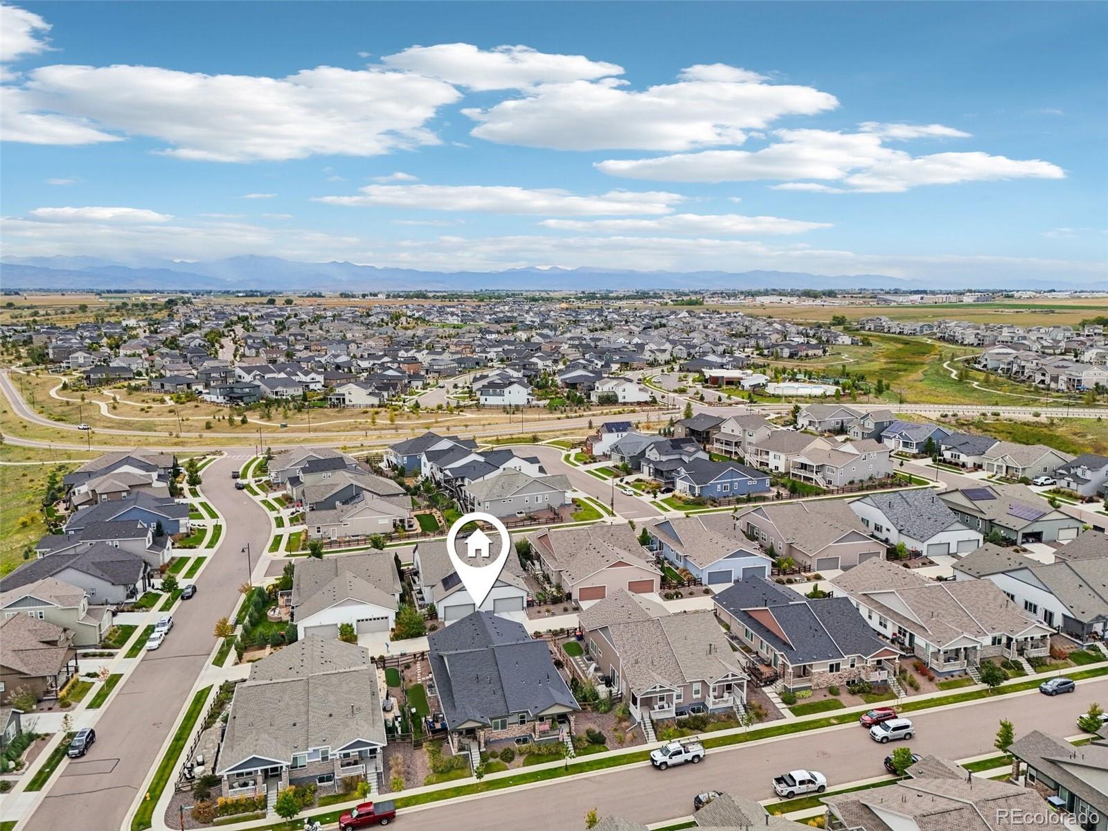 12541 Lake View Street Firestone, CO 80504 - Photo 34 of 50 an aerial view of residential building with parking space