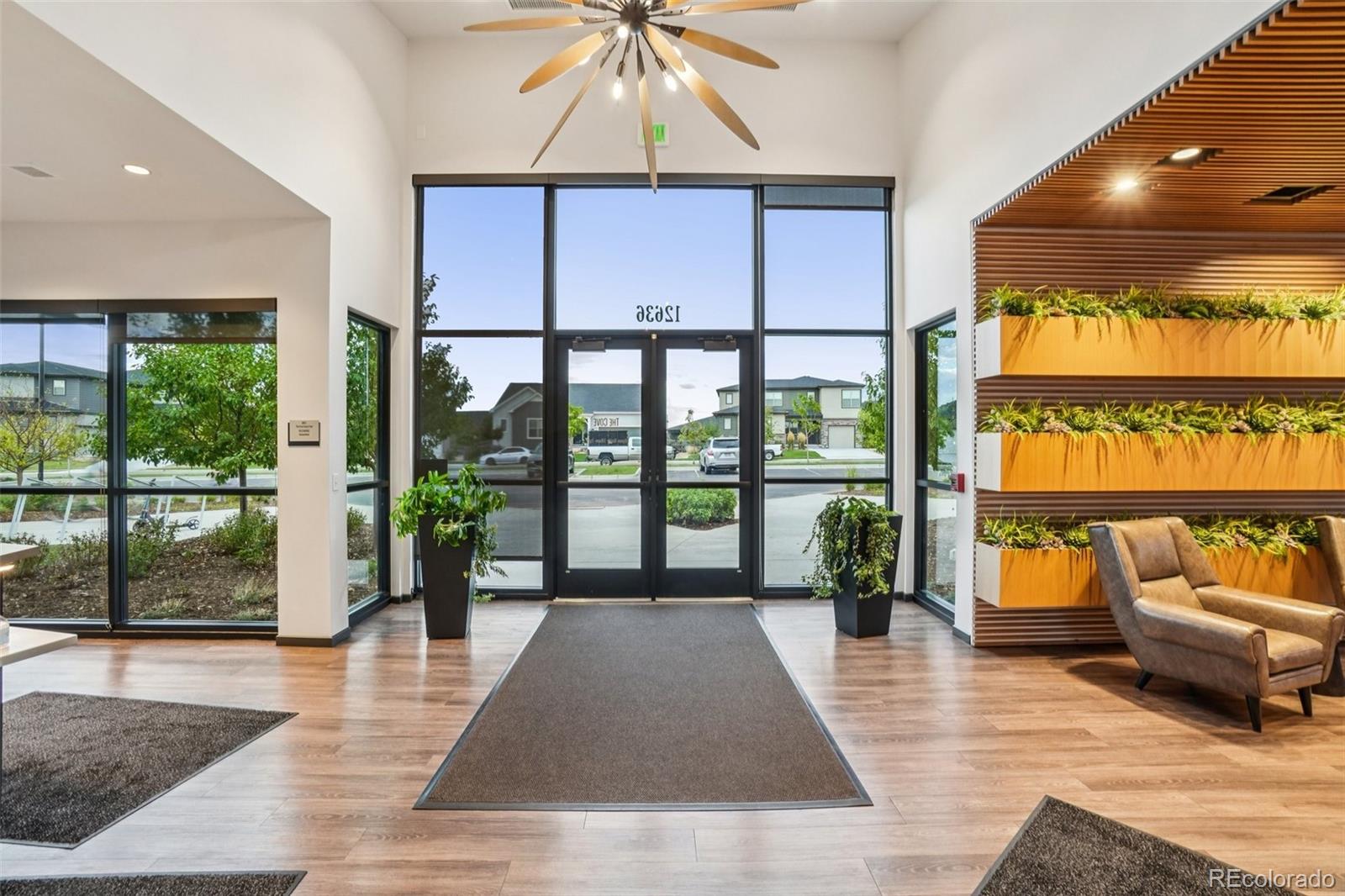 12541 Lake View Street Firestone, CO 80504 - Photo 40 of 50 a spacious bedroom with a large window and a table
