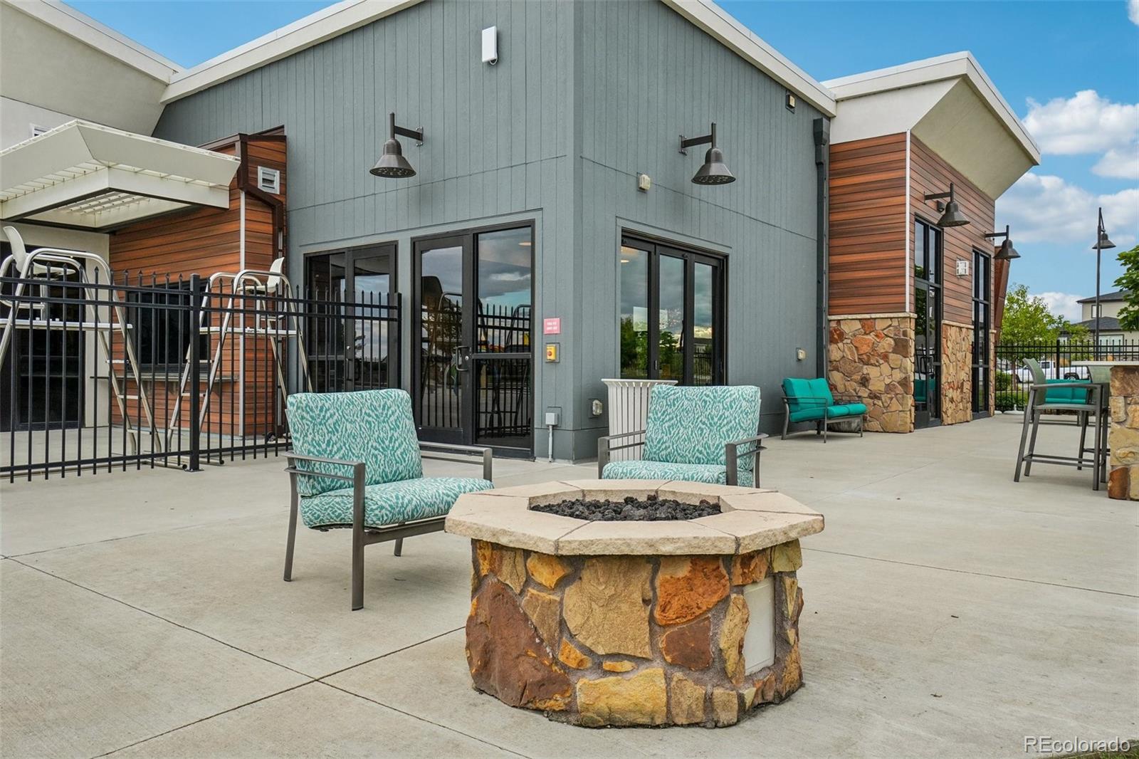 12541 Lake View Street Firestone, CO 80504 - Photo 42 of 50 a view of a chairs and table in a patio