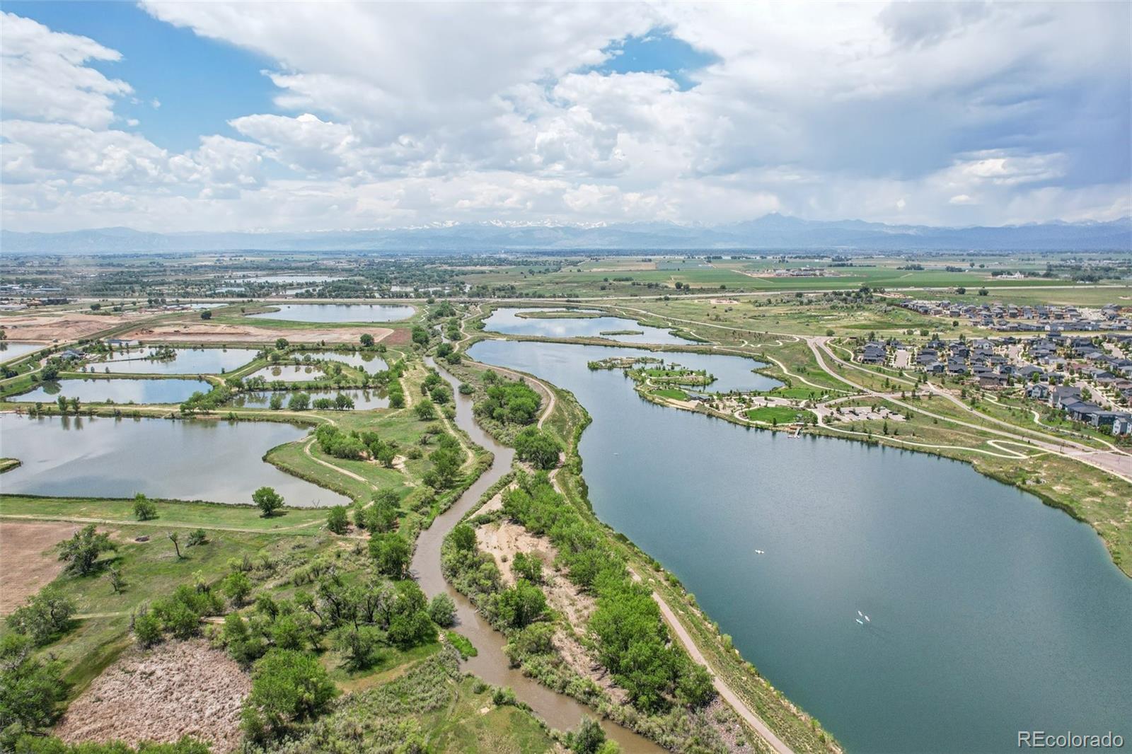 12541 Lake View Street Firestone, CO 80504 - Photo 46 of 50 a view of a lake with a city