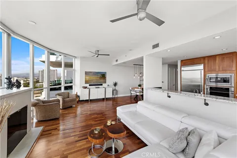 a kitchen with stainless steel appliances granite countertop a stove and a wooden cabinets