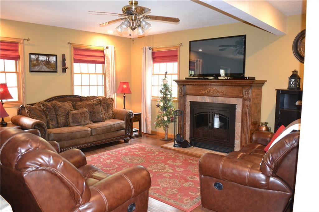 150 Adams Road Kittanning, PA 16201 - Photo 5 of 25 Sunny livingroom with gas ventless fireplace.