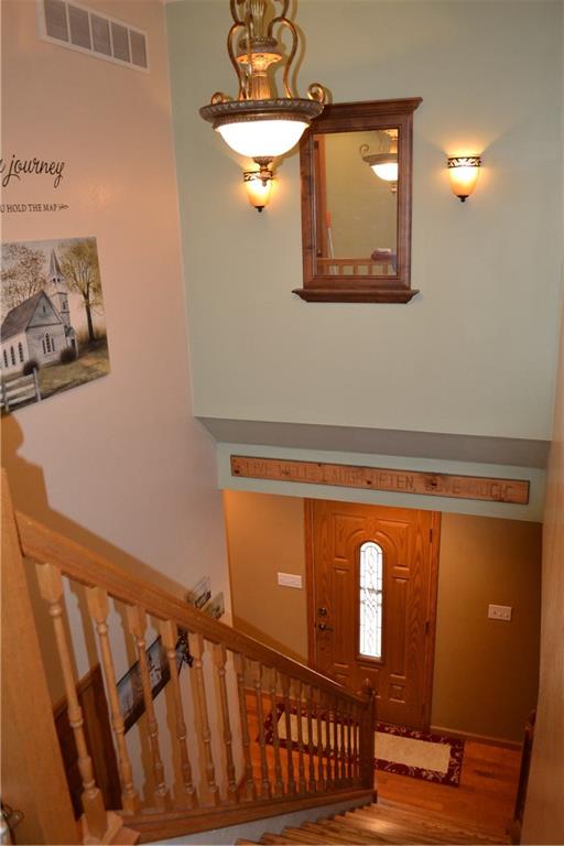 150 Adams Road Kittanning, PA 16201 - Photo 9 of 25 Well lit, welcoming entry way leading to oak staircase