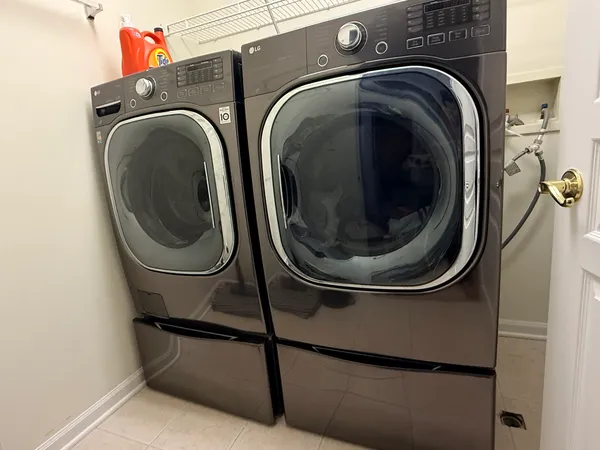 a utility room with dryer and washer