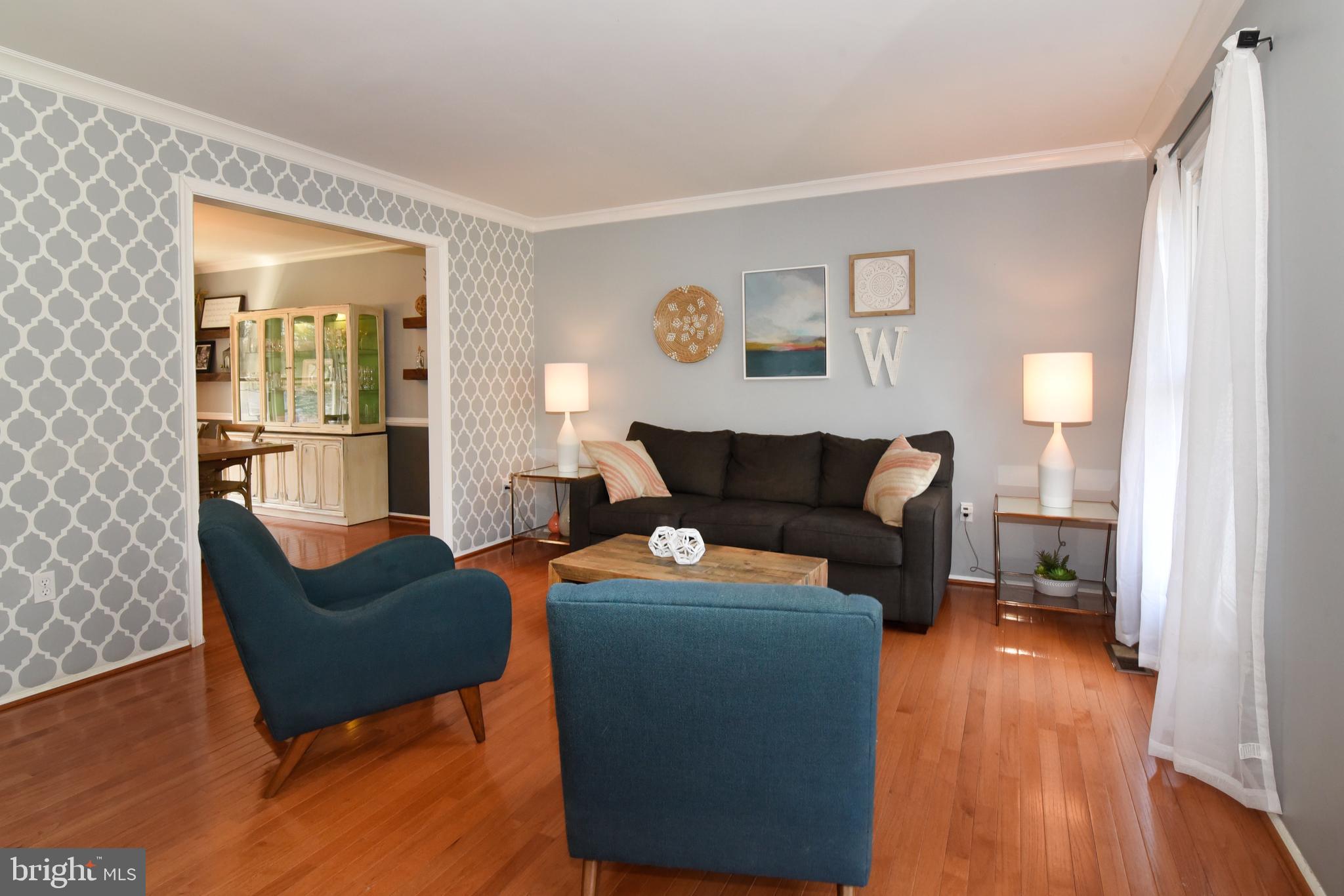 Spacious Living Room with Gleaming Hardwood Floors