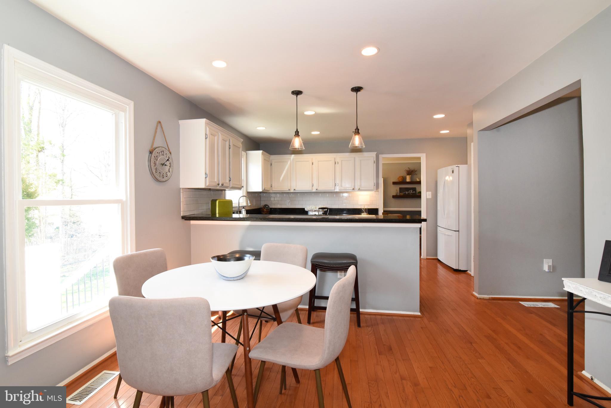 1512 Coat Ridge Road Herndon, VA 20170 - Photo 8 of 40 Breakfast Room and Kitchen.