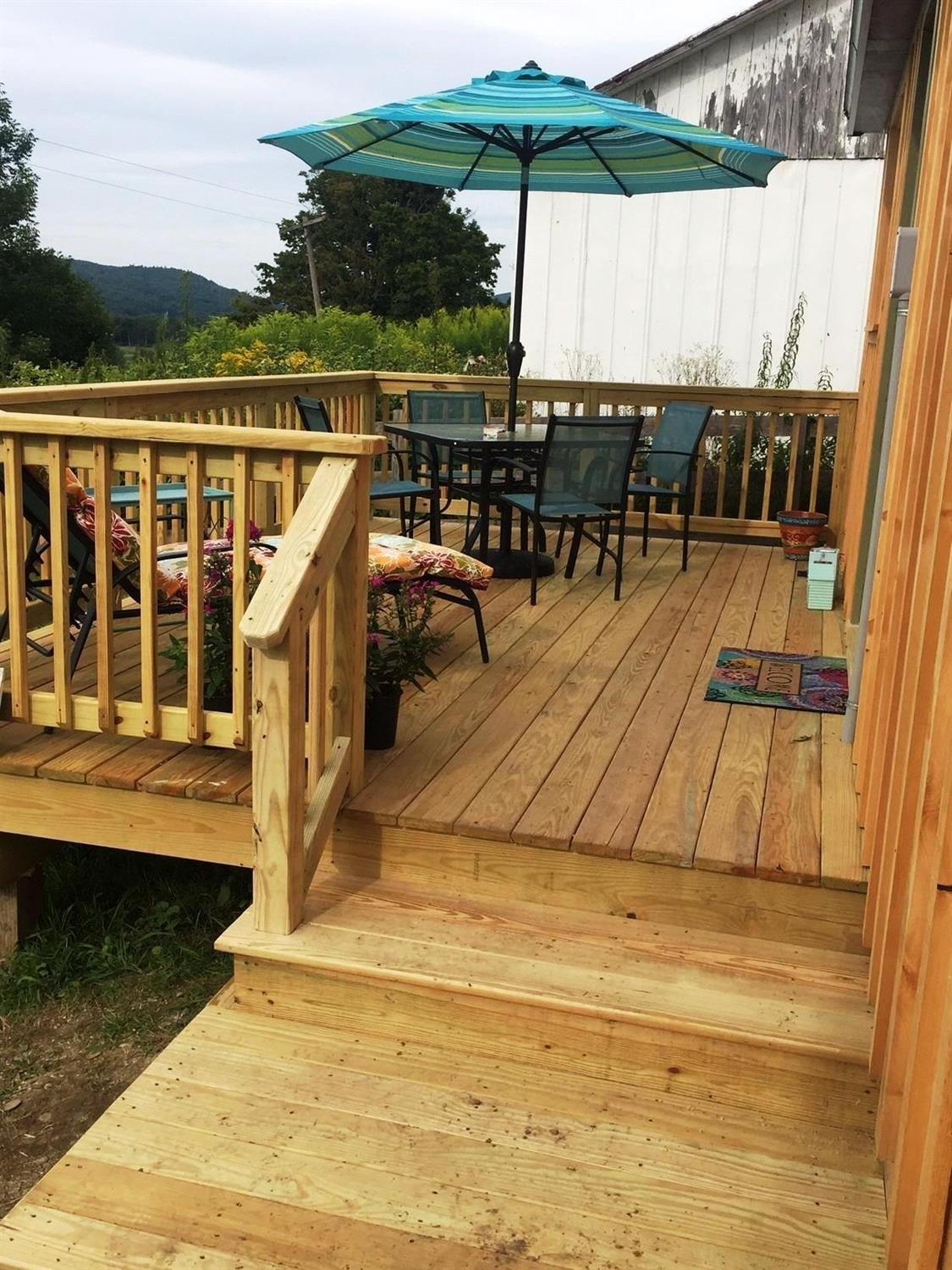 395 Rezen Road Roseboom, NY 13450 - Photo 17 of 22 Private Deck to enjoy the country views.