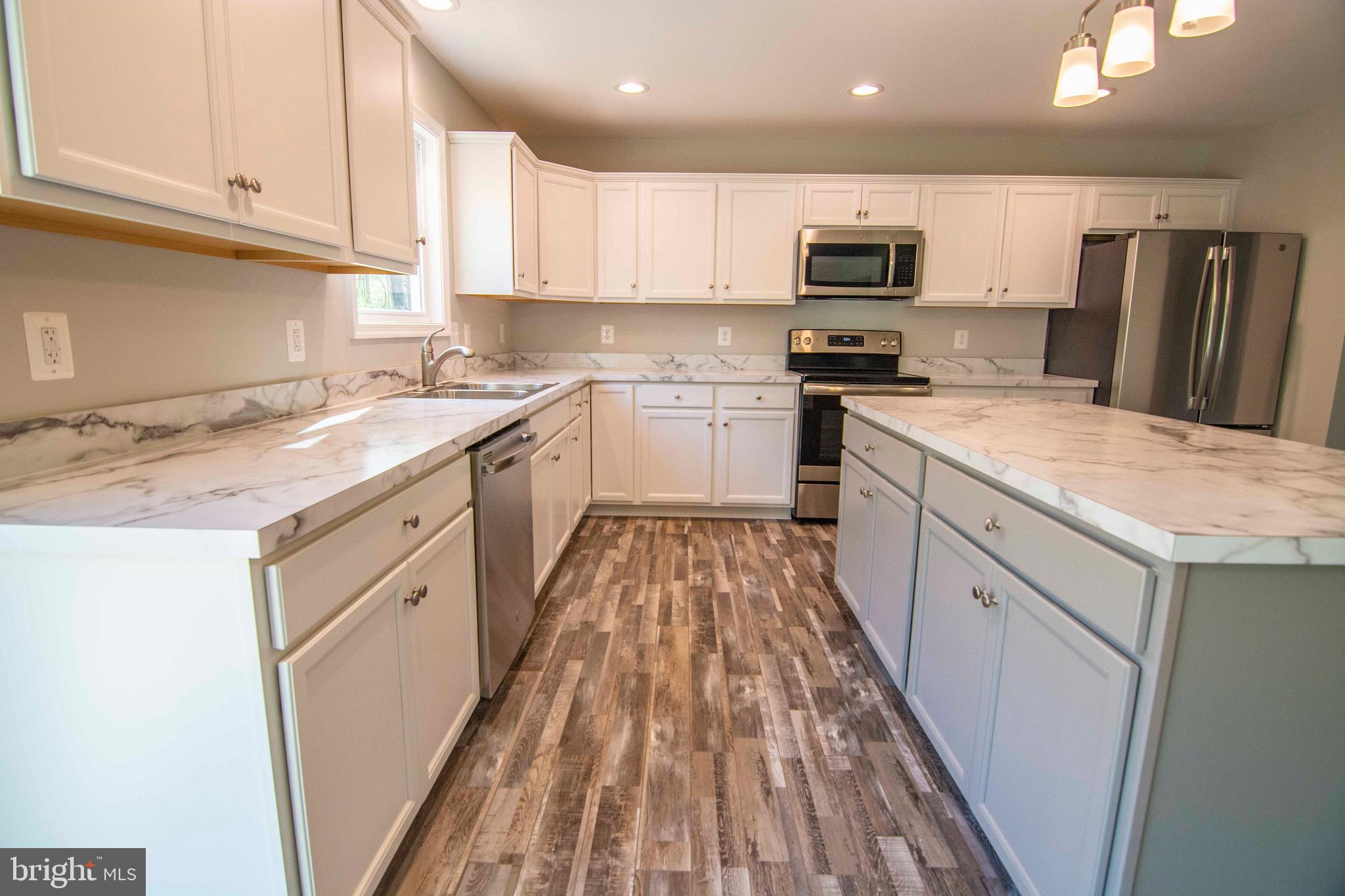 181 Sifer Road Front Royal, VA 22630 - Photo 23 of 46 Custom white cabinetry & SS Appliances