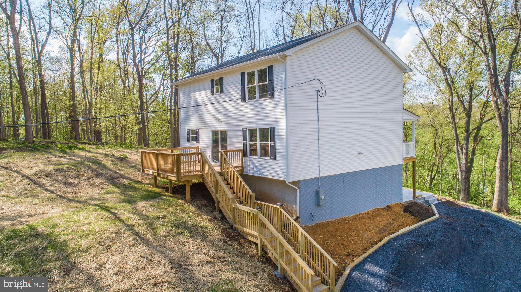 181 Sifer Road Front Royal, VA 22630 - Photo 10 of 46 Custom deck with stairs to driveway